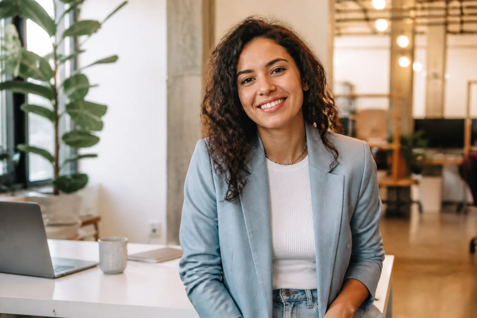Bilingual Hispanic American professional in a modern workspace representing the majority of Hispanic consumers who are fluent in both English and Spanish