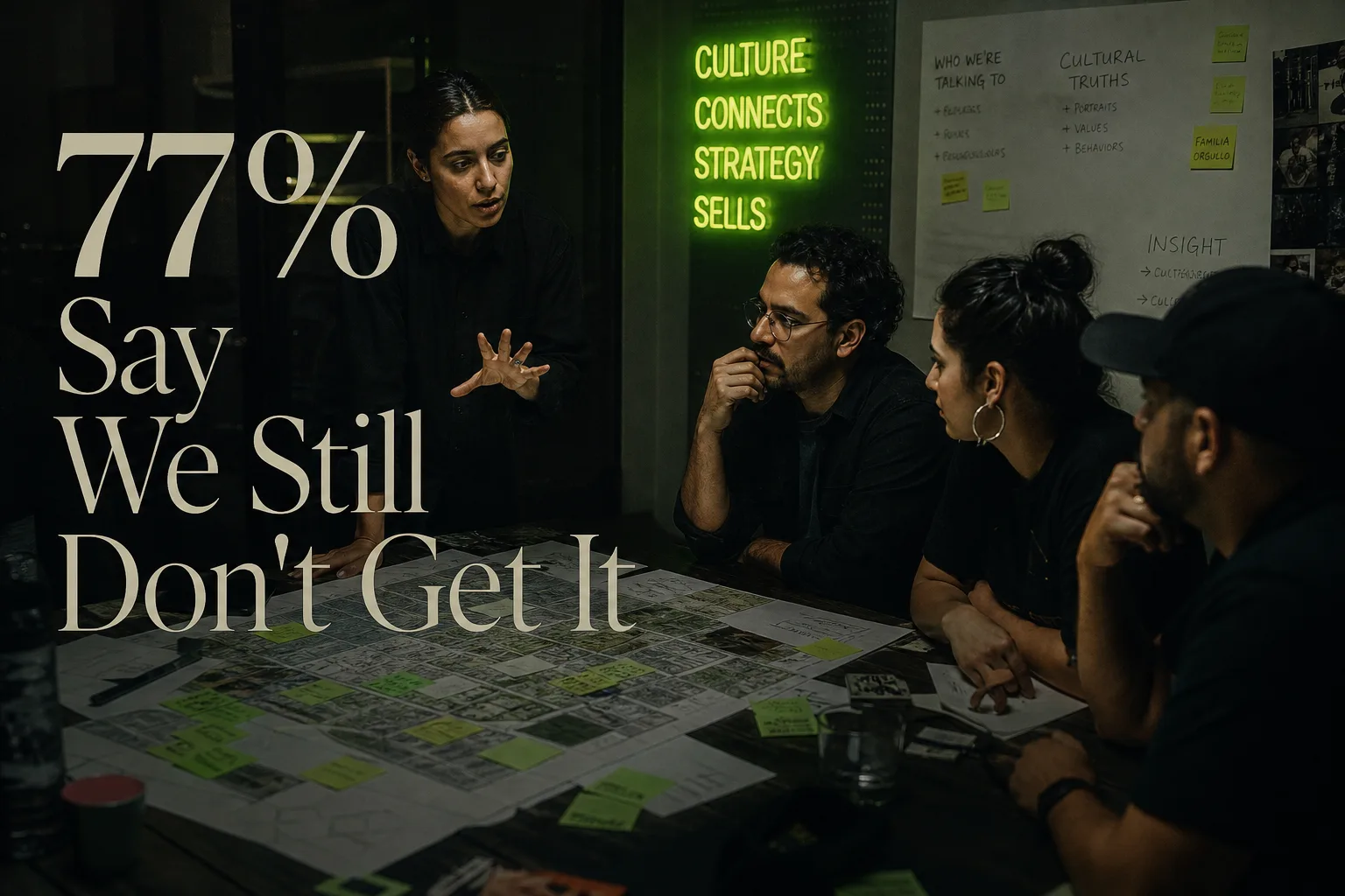 Multicultural strategy team in a candid discussion around a table with market data and notes, editorial documentary style